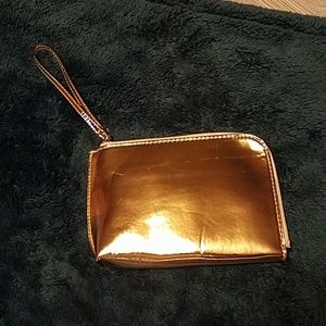 Gold wristlet w/ portable charger 6" X 8"